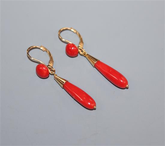 A modern pair of Italian 750 yellow metal and coral drop earrings, overall 41mm.